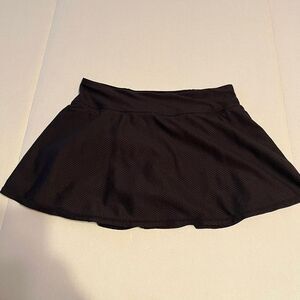 Kyodan black active skorts. Size medium.‎ Preowned in good condition